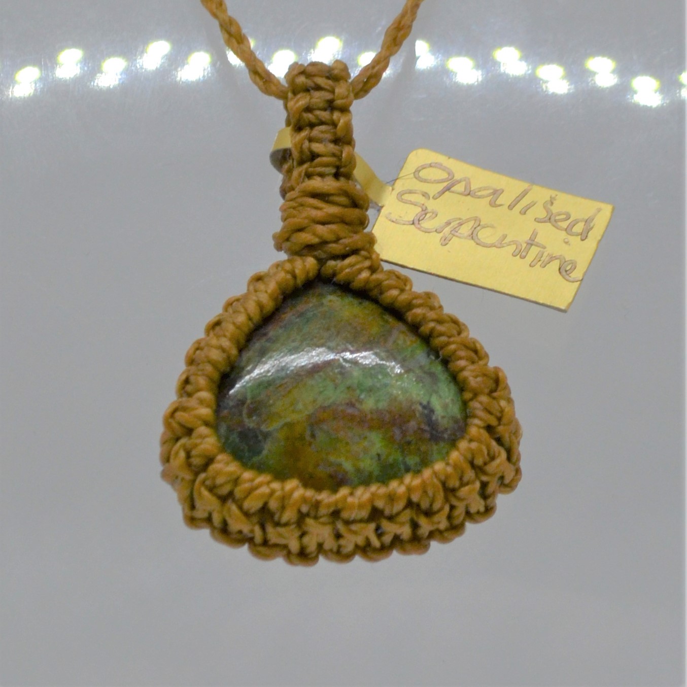 Opalised serpentine pendant in tan knotwork