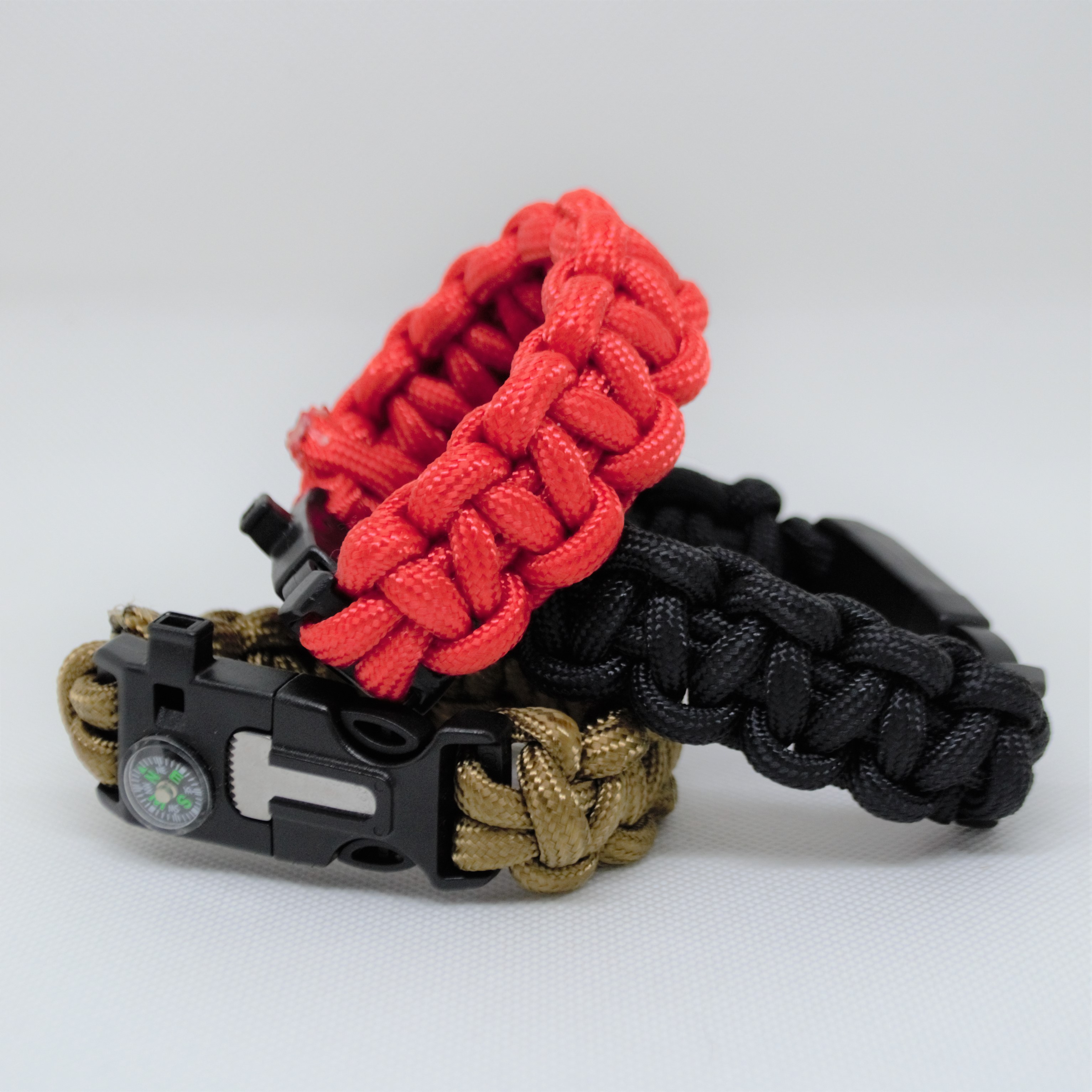 Survival bracelets in red black and tan